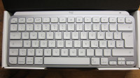 MX Keys Mini za Mac tipkovnica z nemško signaturo.