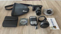 Fotoaparat Canon Eos + več objektivov in dodatkov