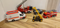 Gasilska avtomobila, reševalec, policijsko vozilo in bager CAT
