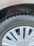 4 zimske gume Michelin 185/65 R 15 s platišči in okrasnimi pokrovi