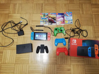 Nintendo Switch in veliko dodatnih iger in opreme.