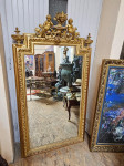 Starinsko baročno ogledalo. S pozlačenim okvirjem