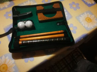 Zložljiva palica za golf v ročni torbici