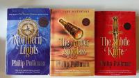 Philip Pullman: Northern lights, The amber spyglass, The subtle knife