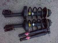 1 komplet amortizerjev za r kangoo1, 1997-2007, skoraj novi