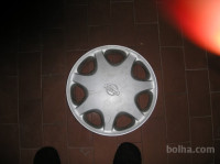 POKROV NISSAN ALMERA GX 1 KOM 14 COL POKROV KOLESA CENA: 15EUR L.96-99