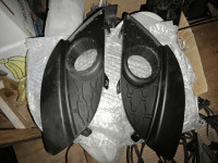 Renault twingo mrezica okrog meglenke okrasne plastike leva desna