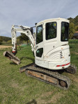 Bager Doosan  Yanmar motor nakladalec valjar demper vrtni traktor 4x4