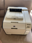 Barvni laserski tiskalnik HP ColorJet CP2025 - mrežni