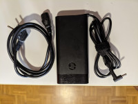 HP polnilec TPN-LA20 230W za HP Zbook