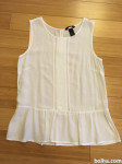Bela majica brez rokavov st. 34
