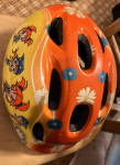 Otroška kolesarska čelada oranžno rumena “punčke” - 48- 54 cm