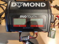 Prodam polnilec DYMOND DUO TOUCH NOVO