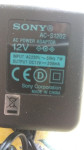 Polnilec adapter Sony 12 V-- 200 MA novo