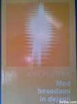Med besedami in dejanji - Anton Stres