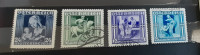 AVSTRIJA 1936 mix žigosane znamke in nežigosana znamka