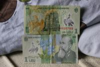 bankovec 1 lei Romunija - plastičen, kot iz tiskarne