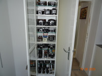 Prodam zbirko fotoaparatov z opremo