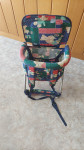 Otroški stolček kot nosila