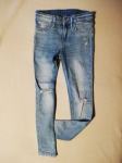 Dekliške jeans "raztrgane" hlače-vel.128/134
