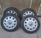 Jeklena platišča z pnevmatikami + okrasnimi pokrovi