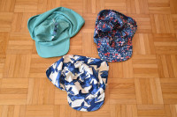 Kape z zaščito za vrat Next, različne velikosti