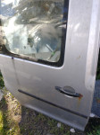 VW volkswagen caddy 2008 drsna vrata desno steklo kljuka ključavnica