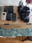 Mobilni telefoni in adapterji