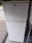 hladilnik z zamrzovalnikom Whirlpool 140 cm višine