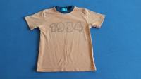 o. 179/ Oranžna kratka majica velikost 8 let oz. 128-134 cm