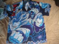 Fantovska srajca-bluza, pisana z motivi, vel  152 oziroma12let