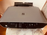 Tiskalnik in skener Canon Pixma MP160