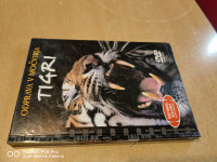 Tigri - odprava v močvirja / knjižica + DVD