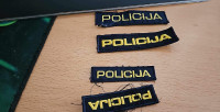 Kupi našitke od Slovenske policije