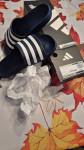 ADIDAS ŠT.42, NOVO! SO MAJHNE ŠTEVILKE BI BILI VERJETNO ZA NOGO 41