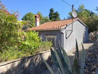 Cres, Punta Križa, Pogana, hiša ob morju