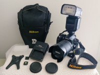 Prodam fotoaparat Nikon D3100 z objektivom  in bliskavico ter opremo…