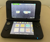 3DS XL, zraven veliko fizičnih iger, kot novo