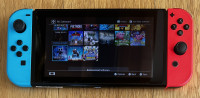 Nintendo Switch + 128GB spominska kartica + 20 iger, odklenjen