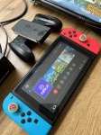 Nintendo Switch+etui+igrice