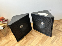 Dva nizkotonska zvočnika črne barve - nova
