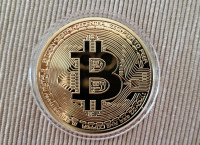 Bitcoin okrasen kovanec