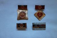 Medalji in priponki DDR