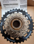 Prodam zadnji verižnik Shimano - ZP MF-TZ500 14-34 mega navoj
