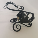 Kovano stojalo za steklenice