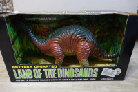 Dinozaver 35 cm iz leta 1995, original škatla, na baterije
