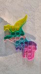 Igrača Pop it DINOZAVER z raznobarvnimi silikonskimi metuljčki