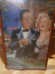 Uokvirjena slika puzzlov Humprey Bogart in Marilyn Monroe