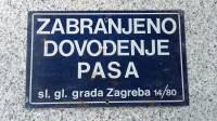 Kovinska tabla:Zabranjeno dovođenje pasa,sl.gl.grada Zagreb-a 14/80