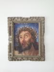 Stara slika Jezusa v 100 let starem okvirju